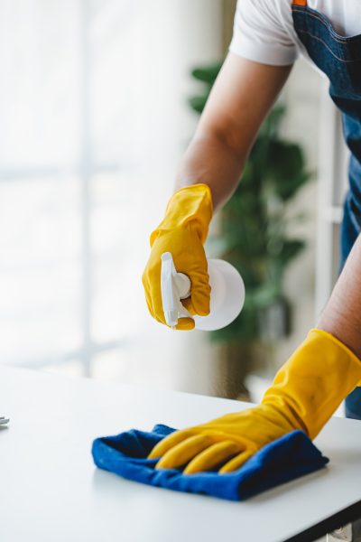 people doing cleaning are using cloths and spraying disinfectant Wipe the desk and floor in the office room.
cleaning staff
cleaning maid